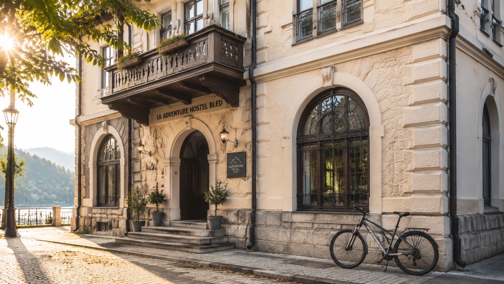 A picturesque view of the 1A Adventure Hostel in Bled, Slovenia, featuring a charming historic stone building.